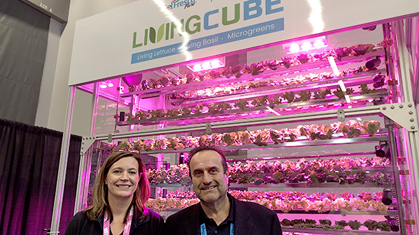 Jo-Ann Ostermann and Carl Mastronardi in front of the cubic farm.